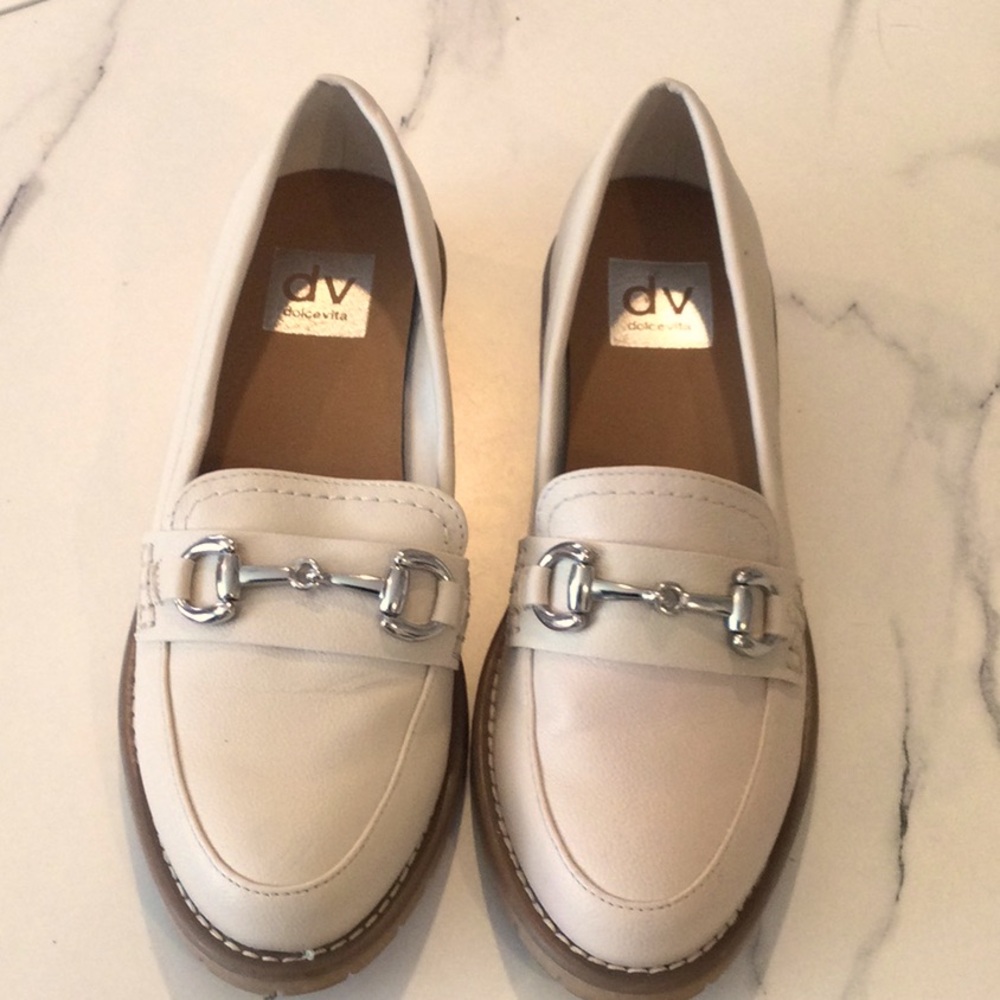 Dolce Vita Women's Celeste Cream Loafers with silver buckle, size 7